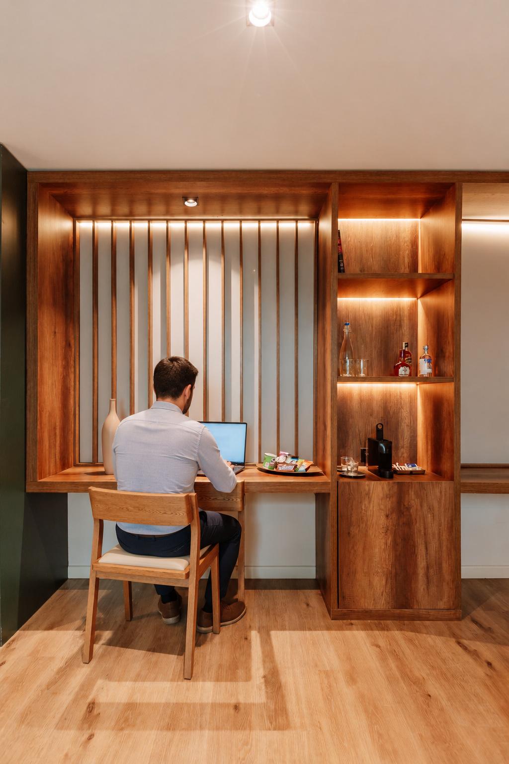 Espacio de descanso y trabajo para viajeros corporativos en 1616 Hotel Medellín